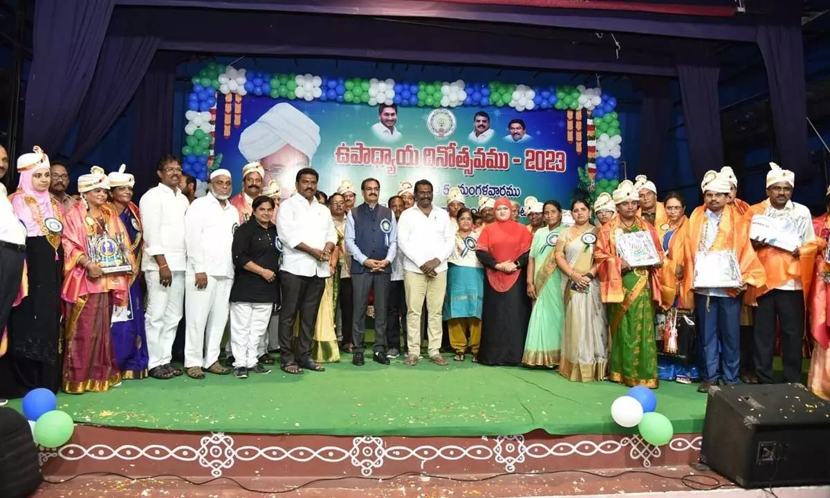 District collector M Venugopal Reddy, MLA Mustafa, state libraries chairman Mandapati Seshagiri Rao, DEO Sailaja felicitating teachers on Tuesday