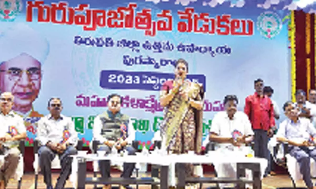 Minister RK Roja speaking at the Teachers’ Day celebrations at Mahati auditorium in Tirupati on Tuesday. District Collector K Venkataramana Reddy, MLC Cipai Subramanyam and others are also seen.