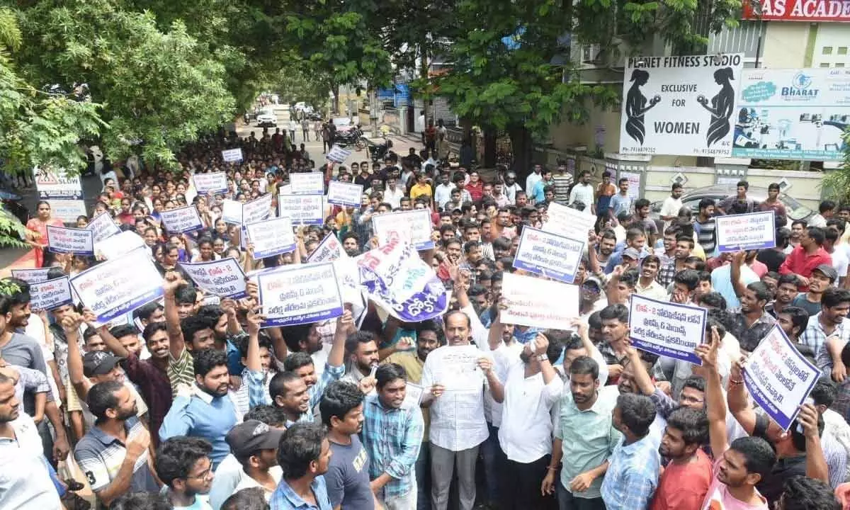 North Andhra Graduates MLC Vepada Chiranjeevi Rao, Andhra Pradesh Udyoga Porata Samiti and unemployed youth organising a rally in Visakhapatnam on Tuesday