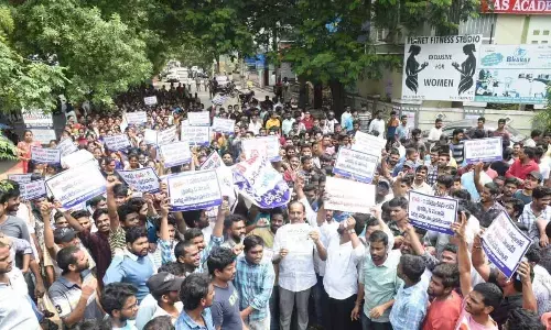 North Andhra Graduates MLC Vepada Chiranjeevi Rao, Andhra Pradesh Udyoga Porata Samiti and unemployed youth organising a rally in Visakhapatnam on Tuesday
