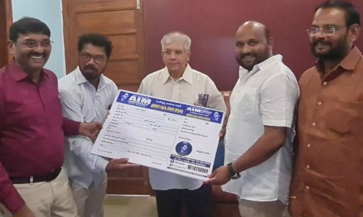 AIM leaders handing over membership receipt to Prakash Ambedkar in Mumbai on Tuesday