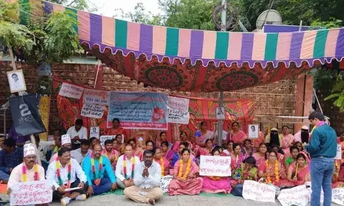 Telangana Samagrashiksha Contract Employees Association JAC members handing over a petition to the portrait of Dr. Sarvepalli Radhakrishnan seeking to regularisation of their jobs.
