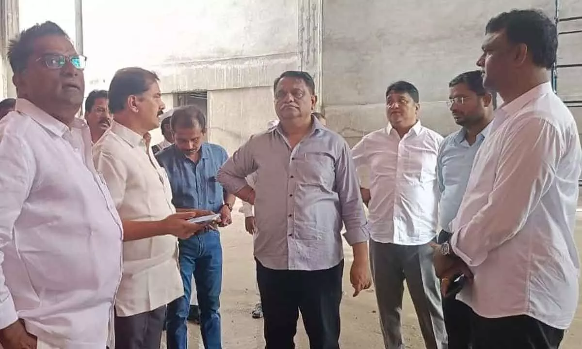 Chief Whip D Vinay Bhaskar, MA&UD Special Chief Secretary Arvind Kumar,  KUDA chairman Sunder Raj Yadav and others inspecting Kaloji Kalakshetram in Hanumakonda on Wednesday