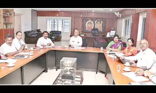TTD Executive Officer A V Dharma Reddy reviewing the last phase of pending works Srinivasa Sethu with TTD and MCT officials at his chambers in Tirupati on Wednesday