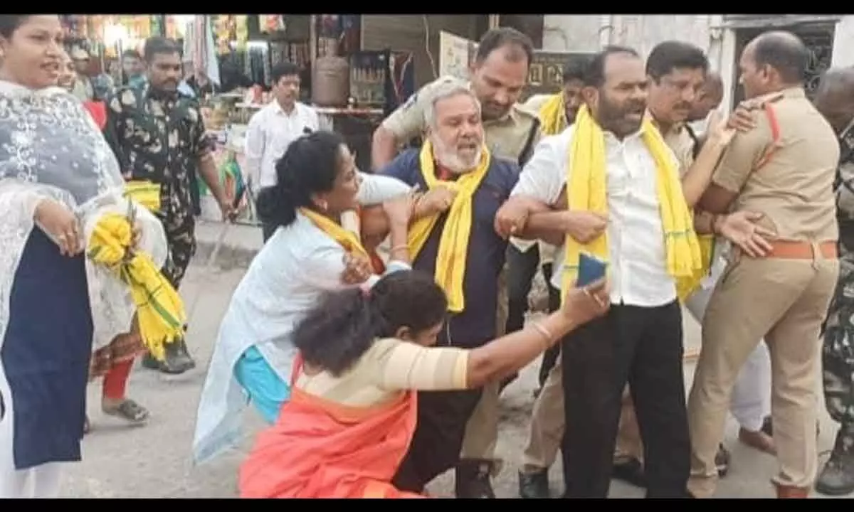 TDP leaders RC Munikrishna and others being taken into custody in Tirupati on Monday.