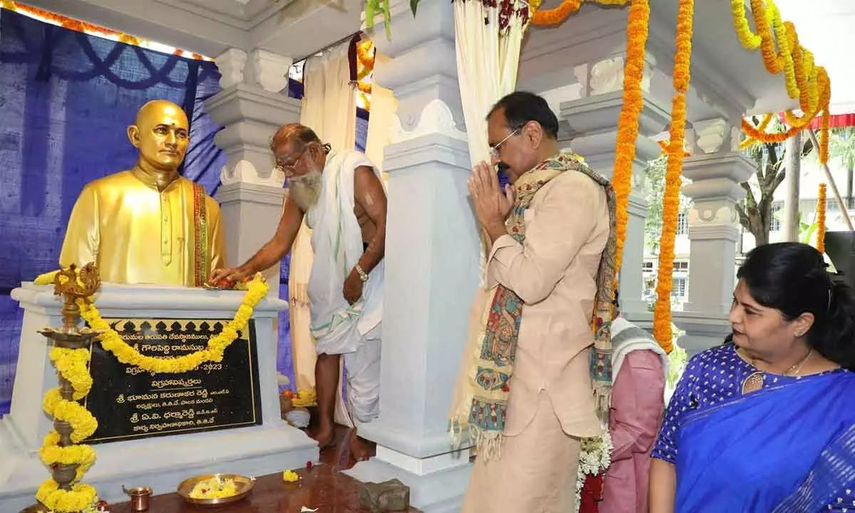 TTD Chairman Bhumana Karunakara Reddy and JEO (H&E) Sada Bhargavi, paying floral tributes at the bust of Sadhu Subrahmanya Shastry to mark his birth anniversary, at Annamacharya Kalamandiram in Tirupati on Sunday
