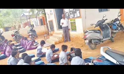 Ashwartha Narayana Swamy educating students and participants on medicinal plants at ZP school in Bukkarayasamudram mandal on Sunday