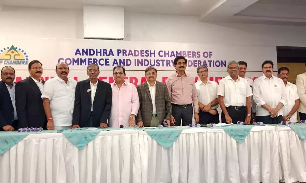 The new office-bearers headed by its president Potluri Bhaskar Rao (sixth from Left) of Andhra Pradesh Chamber of Commerce and Industry Federation elected in Vijayawada