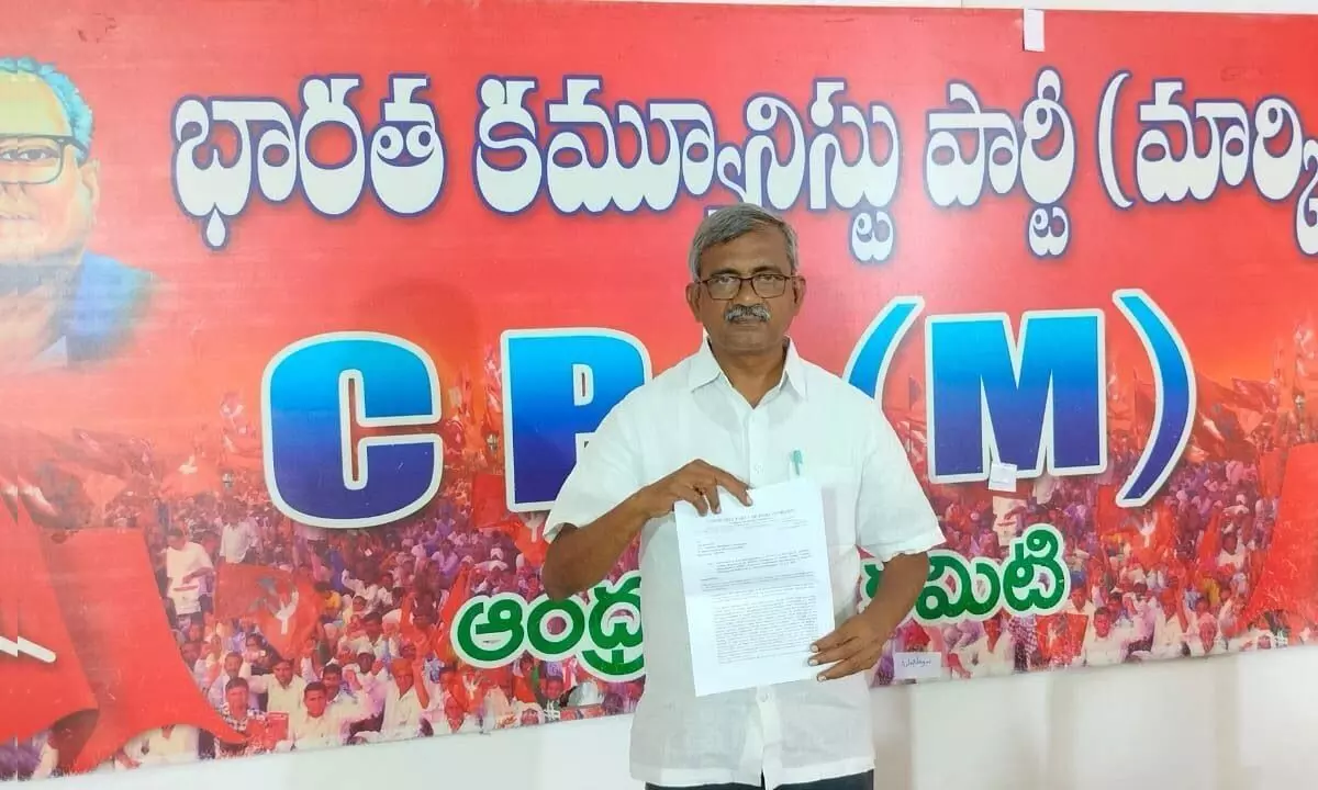 CPM executive committee member Ch Babu Rao shows the letter written to the APERC