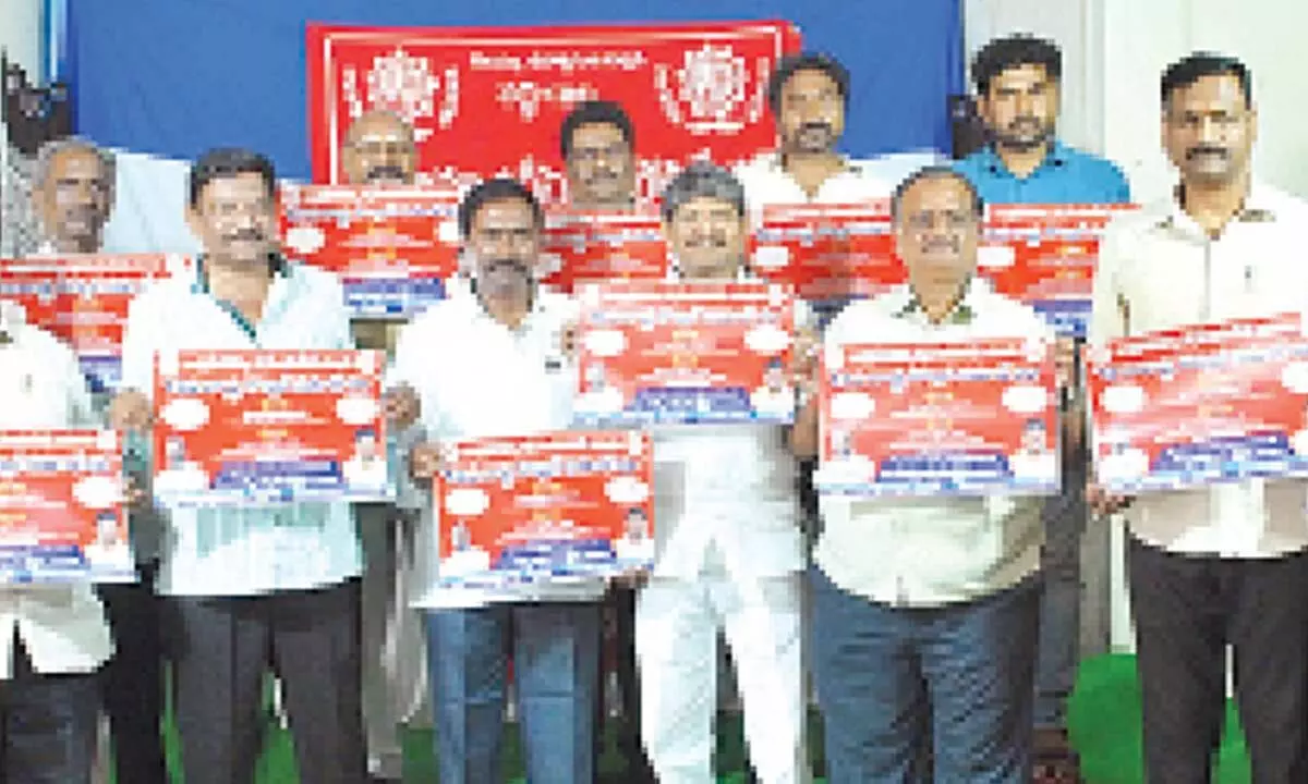 APRSA president Bopparaju Venkateswarlu and others releasing posters for 17th state council meeting in Ongole on Tuesday