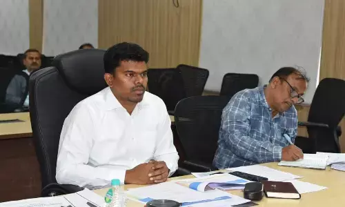 Sathya Sai Collector P Arun Babu addressing the PM Vishwakarma Yojana scheme meeting in Puttaparthi on Monday