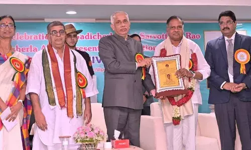 Governor S Abdul Nazeer presenting Gadicherla Award 2023 to Mandali Buddha Prasad in Machilipatnam on Thursday