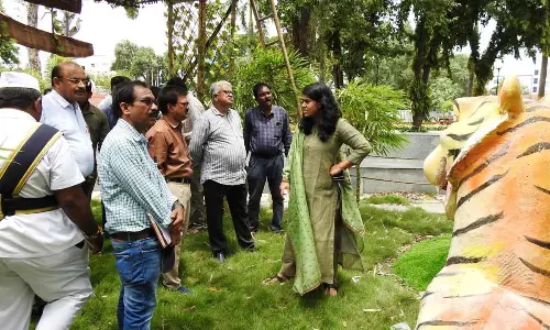 GMC Commissioner Kirthi Chekuri along with officials visiting Gandhi Park in Guntur on Thursday