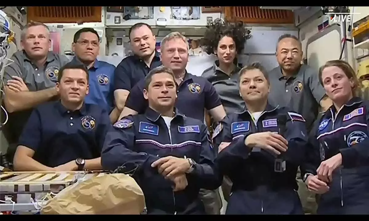 NASA astronaut, crewmates reach ISS for science expedition