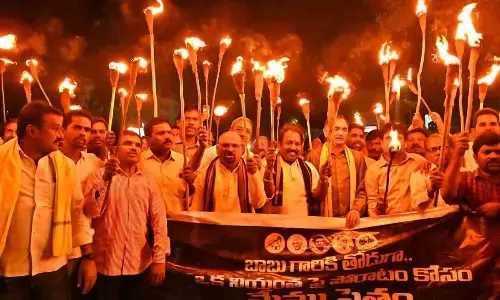 TDP leaders take out a torch rally for the release of the party chief N Chandrababu Naidu in Visakhapatnam on Saturday