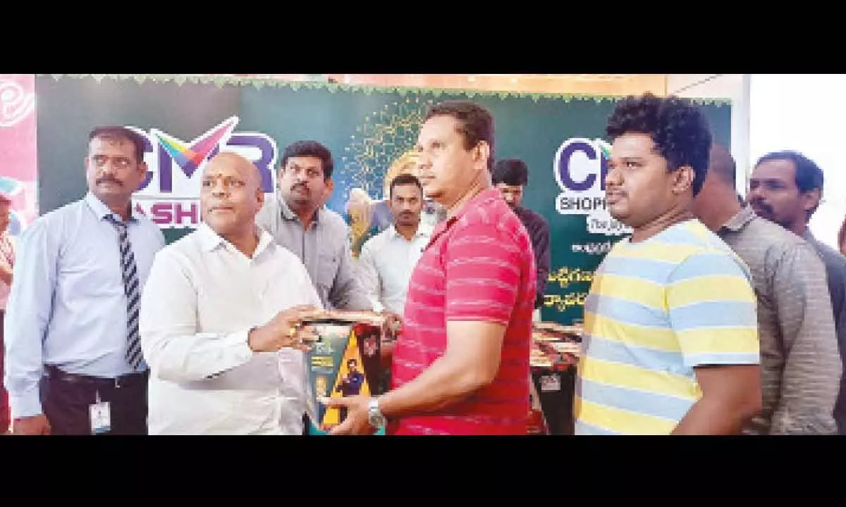 CMD of CMR Group Mavuri Venkata Ramana distributing seed Ganesh idols to people in Visakhapatnam