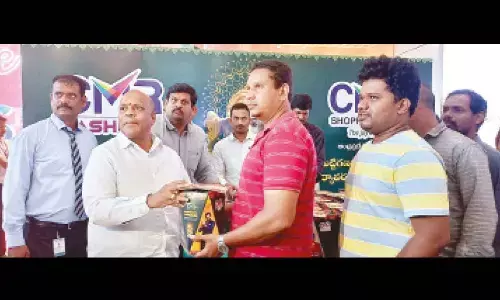 CMD of CMR Group Mavuri Venkata Ramana distributing seed Ganesh idols to people in Visakhapatnam