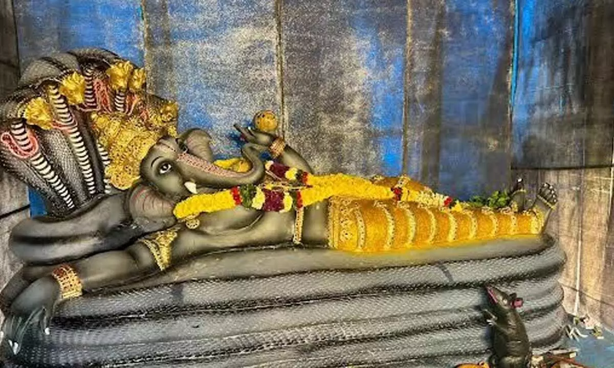 ‘Anantha Sayana’ Ganesh resting over Adi Sesha at a pandal set up at Simhachalam in Visakhapatnam