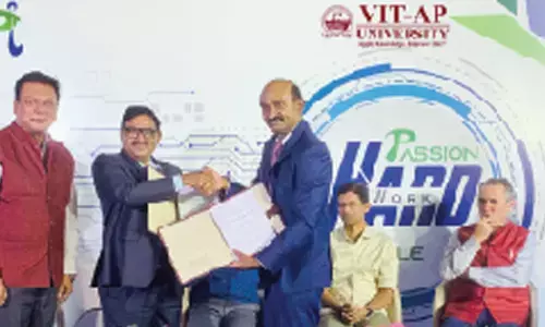 VIT-AP University Vice-Chancellor Dr SV Kota Reddy, founder and CEO of Pi Datacenters Kalyan Muppaneni exchanging MoU. Dr Ameet Chavan, Director of IIEC of VIT-AP University is also seen.