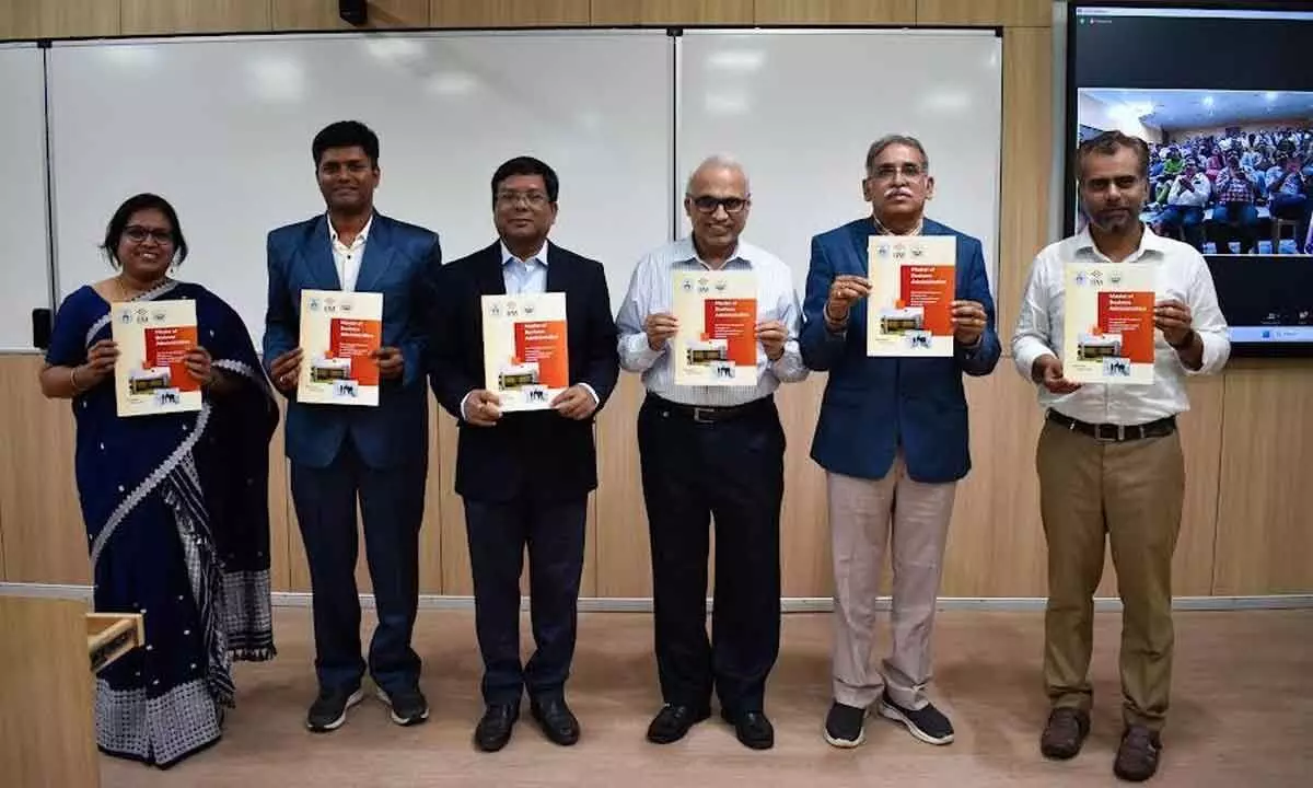 IIM-V director M Chandrasekhar along with others releasing the brochure of the programme in Visakhapatnam on Wednesday