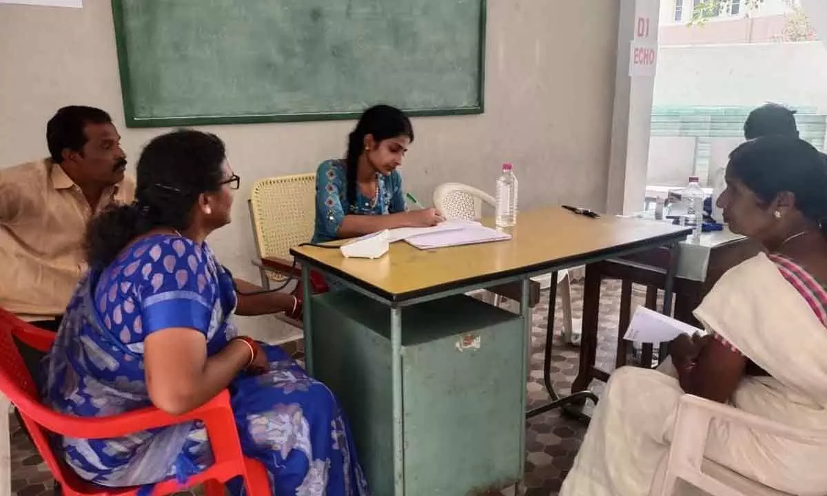 Medical tests being conducted at the health camp held in Madanapalle on Wednesday.