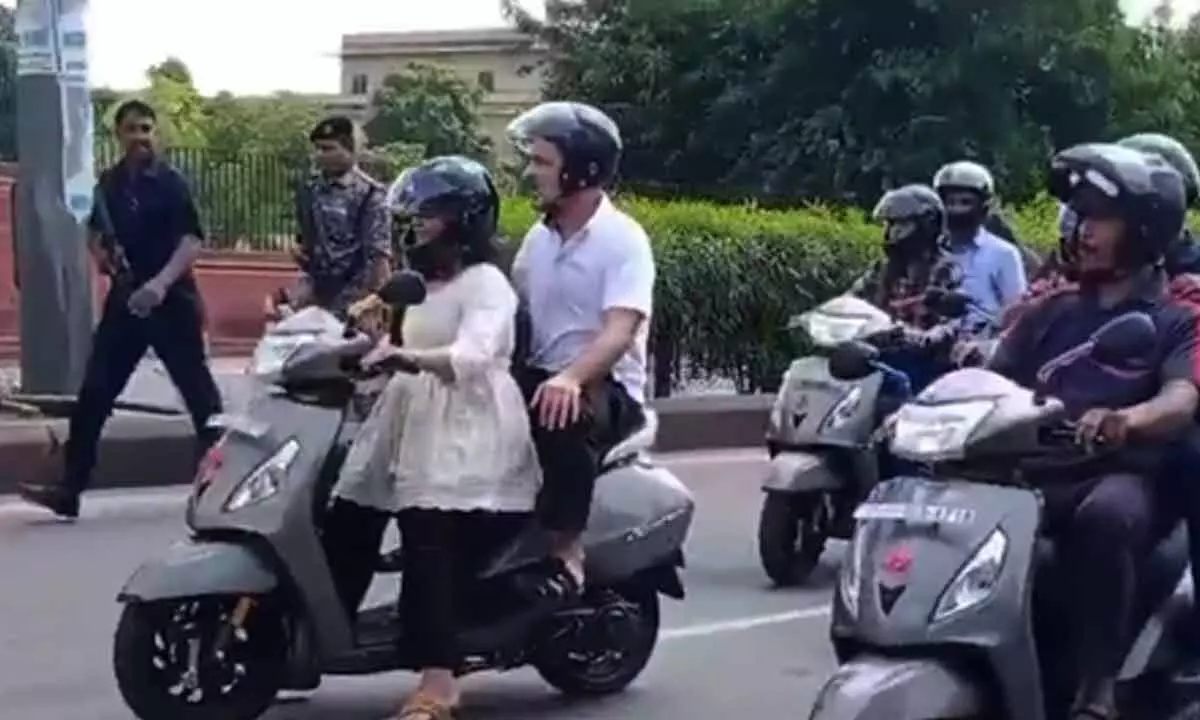 Rahul Gandhi travels with student on scooter in Jaipur