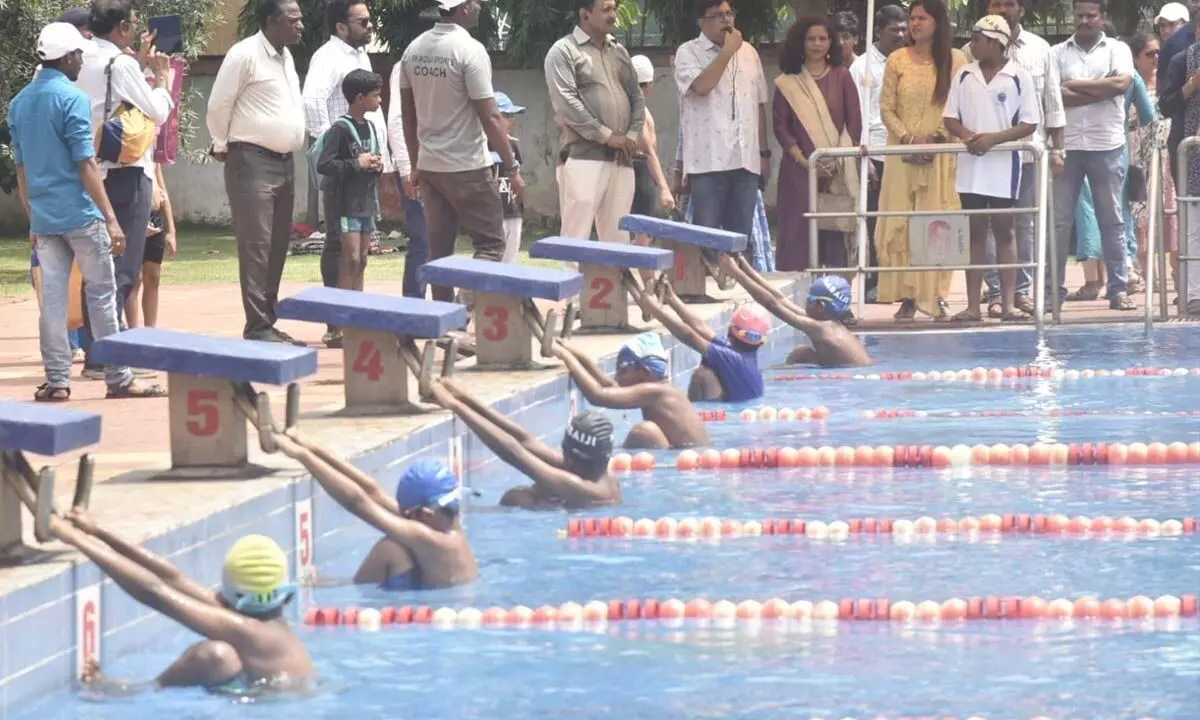 DRM Saurabh Prasad inaugurating the 4th DRM CUP Swimming Championship in Visakhapatnam on Saturday