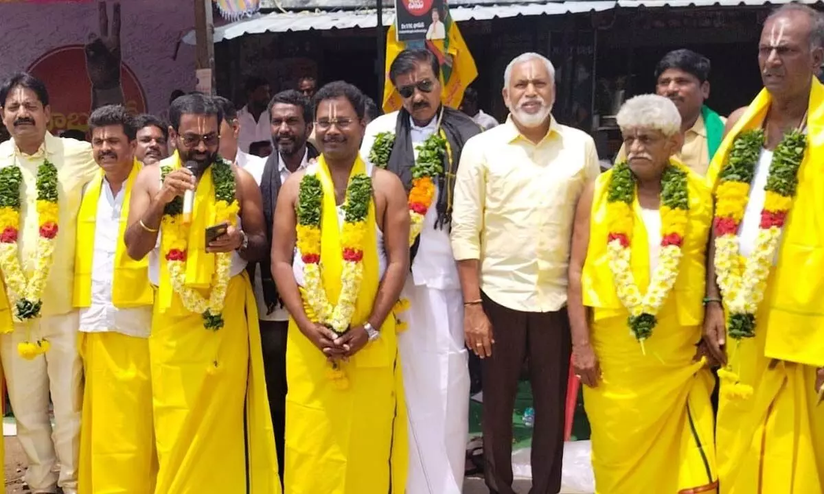 TDP leaders staging a novel protest against the arrest of former CM Naidu in Gangadhar Nellore mandal on Saturday