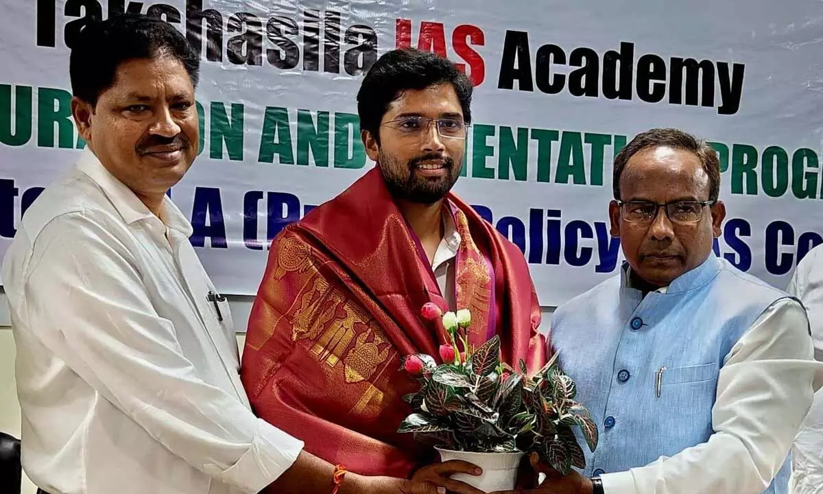 Takshasila IAS Academy director BSN Durga Parasad being felicitated by Acharya Nagarjuna University Vice-Chancellor  Professor P Rajasekhar and HRD coordinator Prof Nagaraju at ANU on Saturday