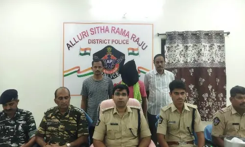 ASR District SP Tuhin Sinha producing Maoist leader Ungal before the media at Chinturu police station in ASR district on Saturday