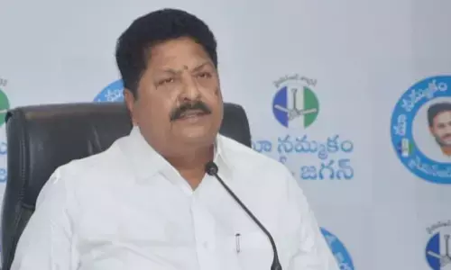 Civil supplies minister Karumuri Venkata Nageswara Rao addressing  a press conference at YSRCP central office in Tadepalli on Saturday