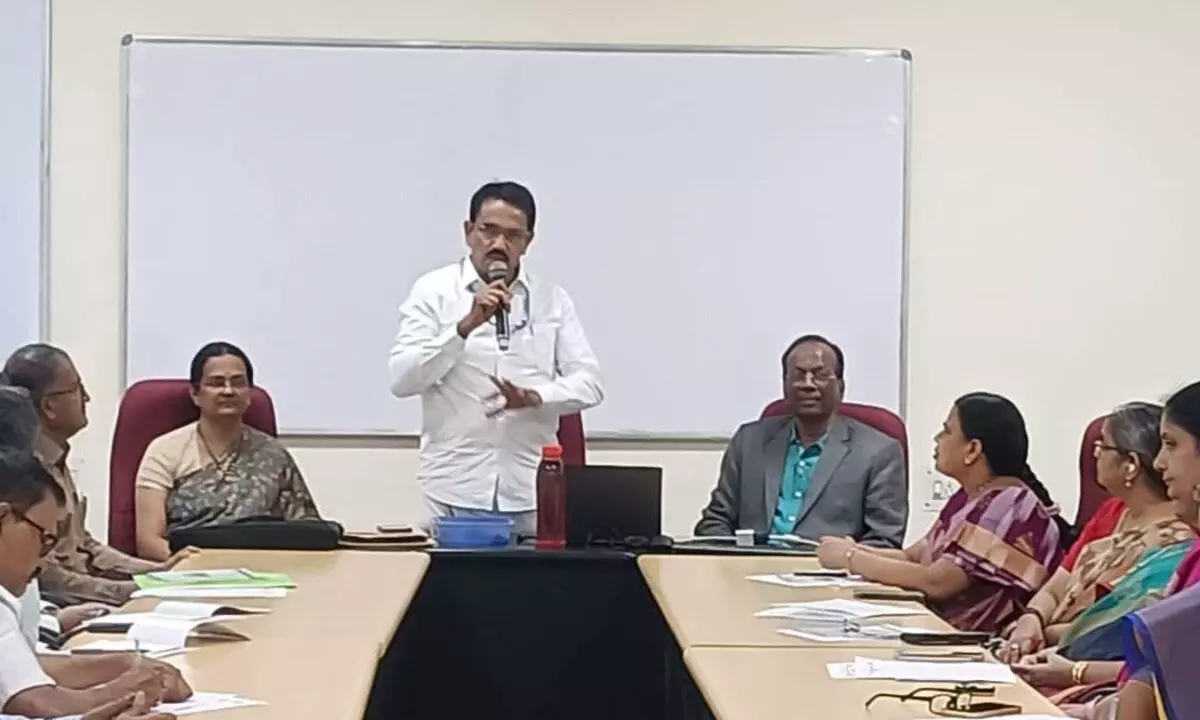 National trainer M Nagraj speaking at training programme for teachers in Tirupati on Monday