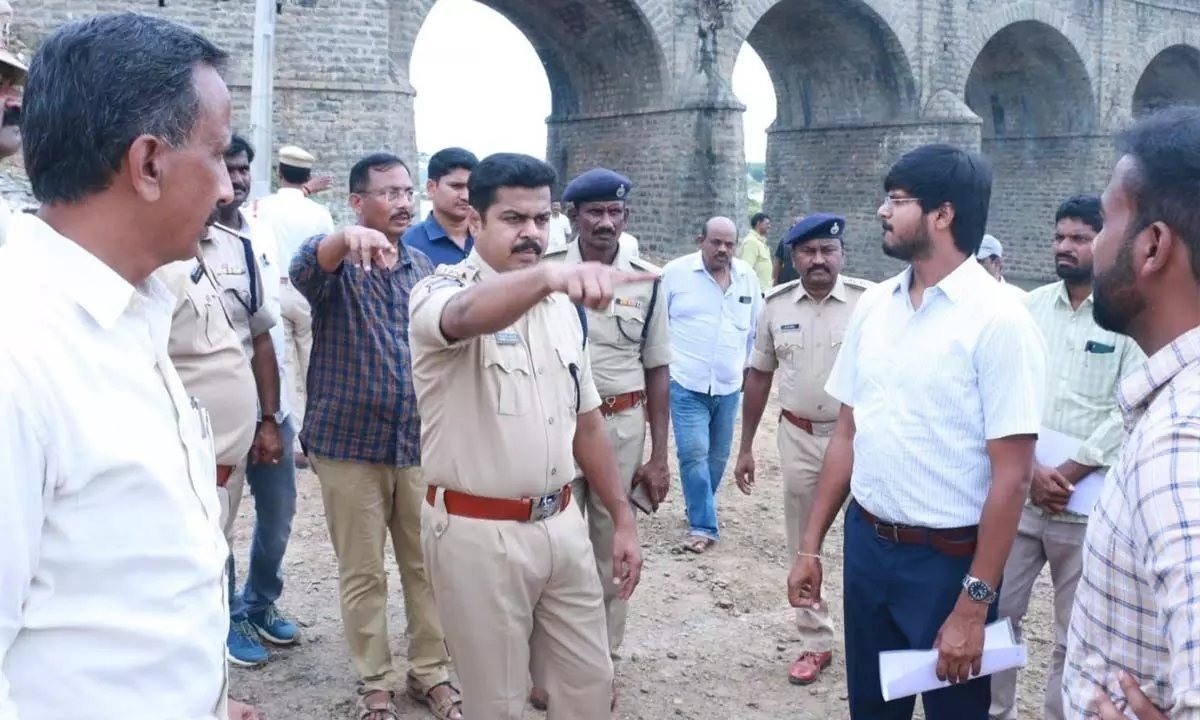 Collector VP Gautham and CP Vishnu S Warrier inspecting the arrangements for Ganesh immersion in Khammam on Monday
