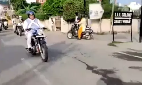 Haryana CM rides motorcycle to reach airport