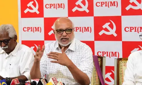CPM politburo members M A Baby and B V Raghavulu addressing a press conference in Vijayawada on Tuesday. Party State secretary V Srinivasa Rao is also seenPhoto: Ch Venkata Mastan