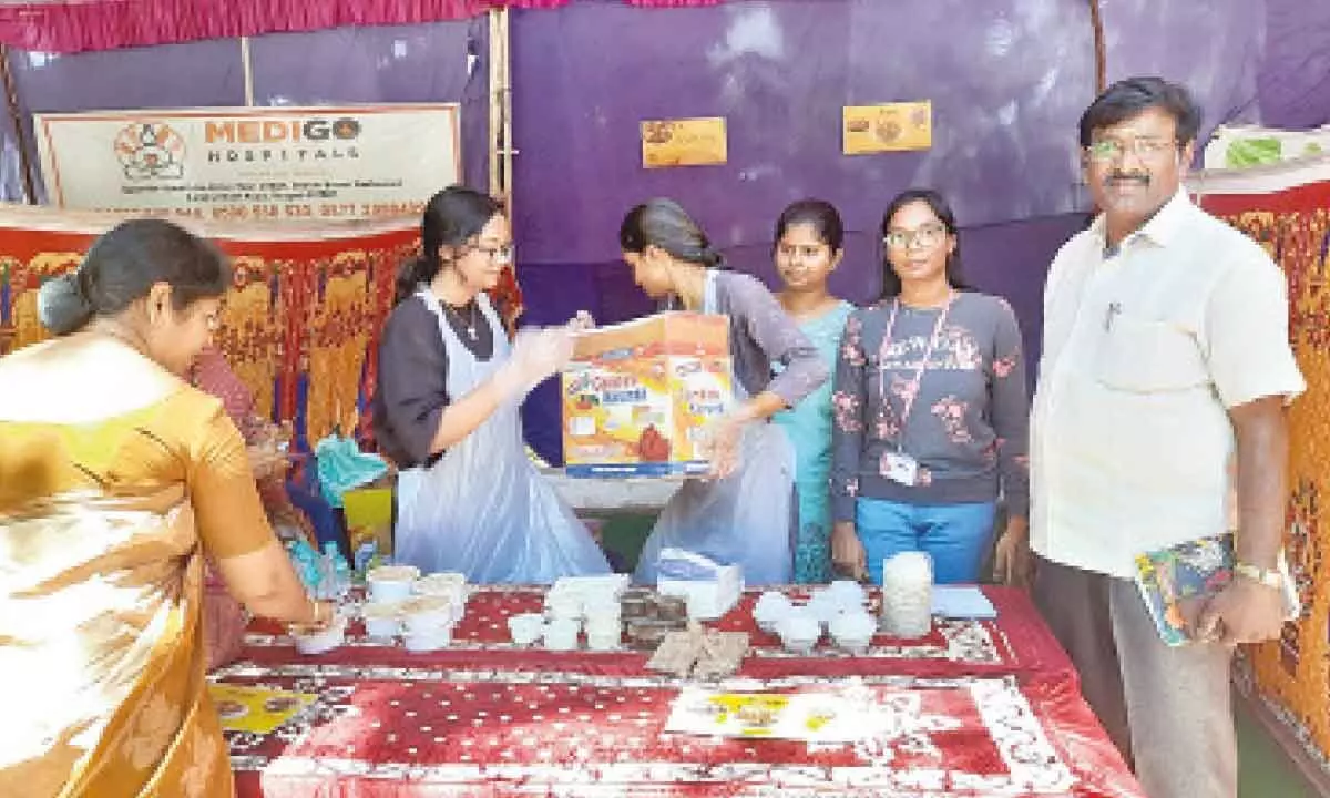 Students at a food stall arranged at SPMVV on the occasion of National Nutrition month celebrations in Tirupati on Wednesday.
