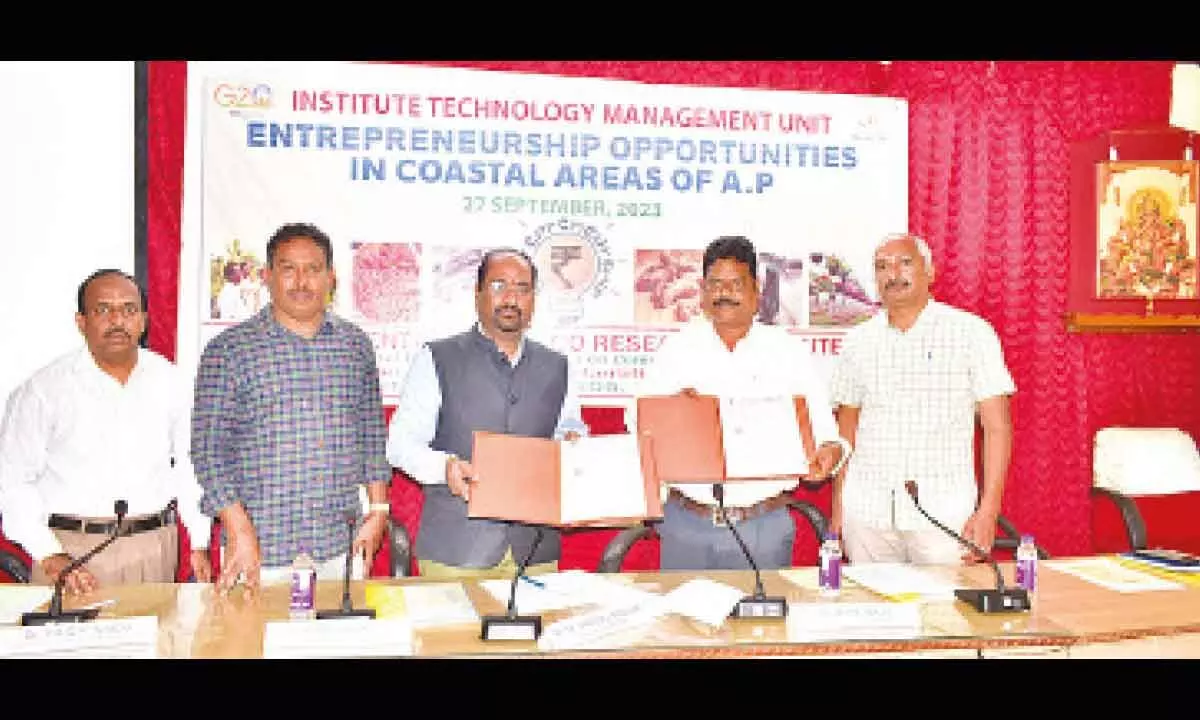 The officials of ICAR-CTRI and APCNF exchanging an MoU in Rajamahendravaram on Wednesday. ICAR-CTRI Director Dr M Sheshu Madhav and others are also seen.