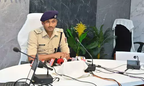RPF Senior Divisional Security Commissioner Ch Raghuvir addressing the media in Visakhapatnam on Wednesday