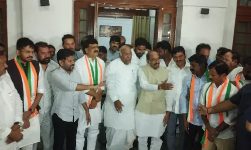 Mynampally and son join Congress in New Delhi