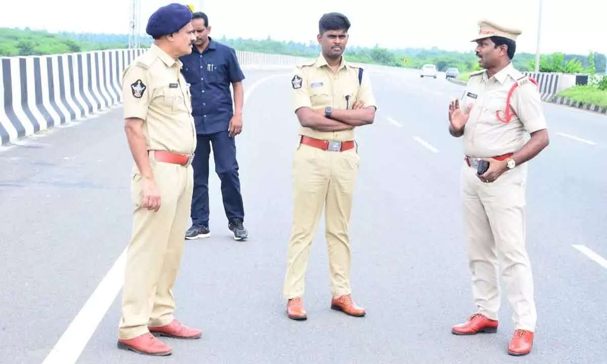 District SP P Jagadeesh inspecting the black spots on the highway under Gopalapuram police station of East Godavari district on Friday
