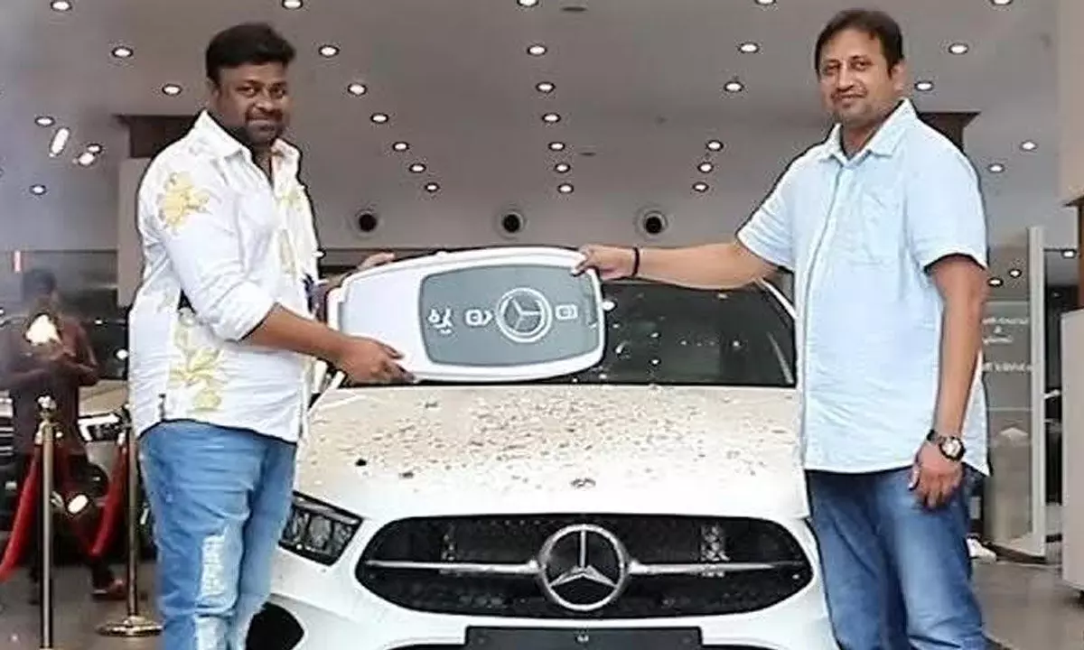 SKN follows the trend; gifts swanky Benz to director Sai Rajesh
