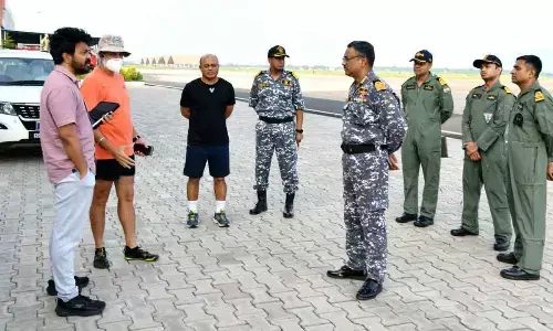 GVMC Commissioner C M Saikanth Varma discussing with naval officers in Visakhapatnam on Friday