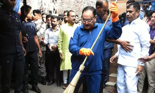 BJP chief in Delhis Ambedkar Basti for Swacchta Abhiyan