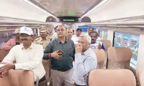 ADRM Sudhakar, Tirupati Station Director K Satyanarayana and others monitoring the cleanliness drive in Vande Bharat Express in Tirupati station on Sunday