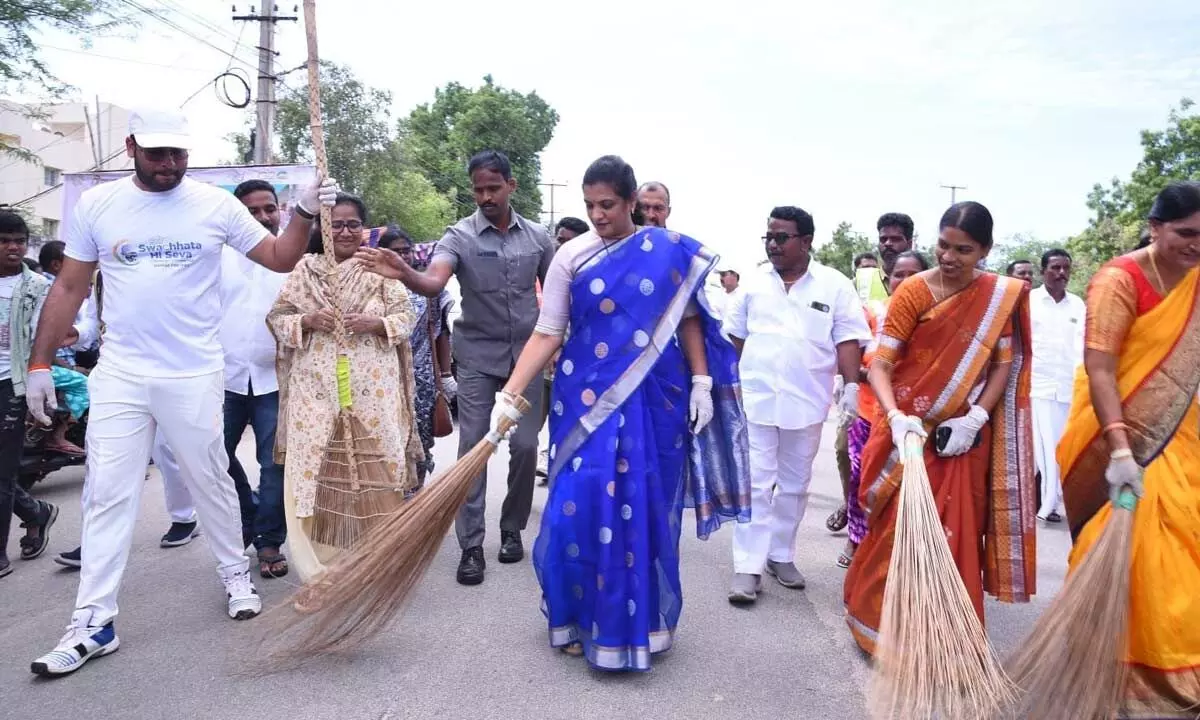 District Collector M Gautami and joint collector Kethan Garg participating in clean and green drive to mark the Mahatma Gandhi’s birth anniversary in Anantapur on Monday