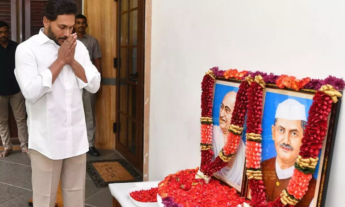 Chief Minister Y S Jagan Mohan Reddy pays tributes to Mahatma Gandhi and former PM Lal Bahadur Shastri at his camp office