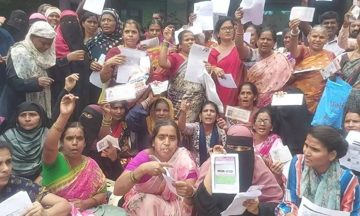 Aghast over denial of 2BHK houses, families hold protest in Rajendranagar