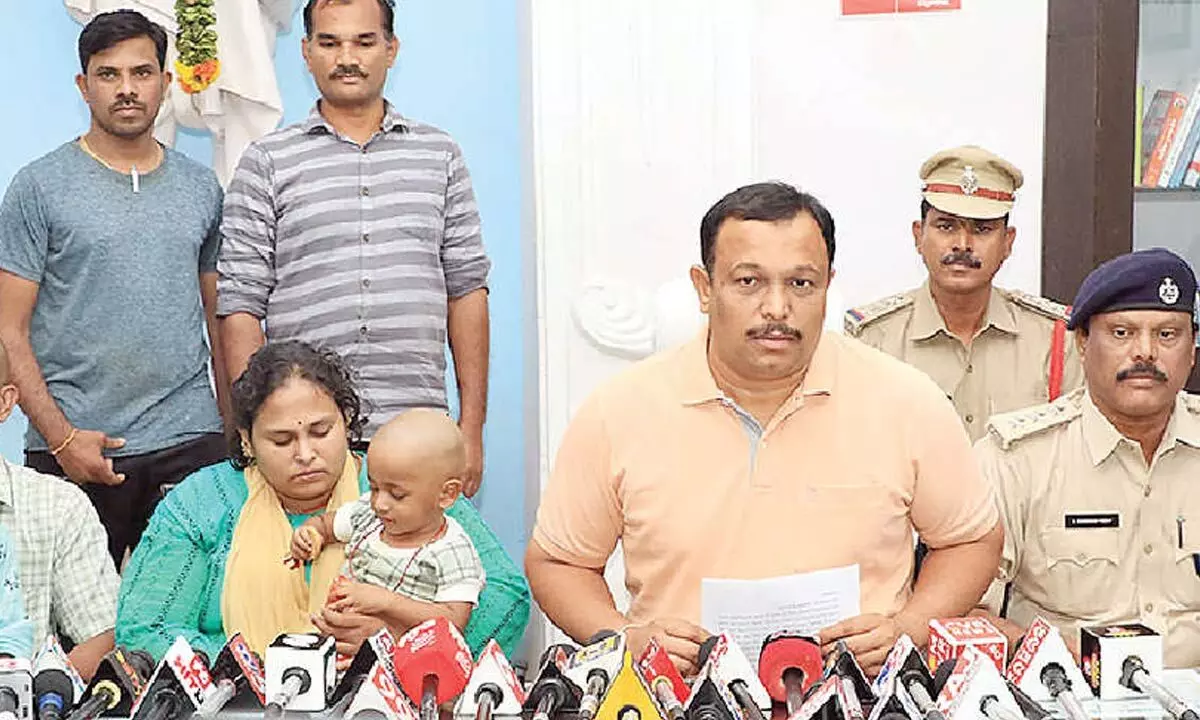 Tirupati SP P Parameswar Reddy speaking to the media on Tuesday along with the parents of the missing boy