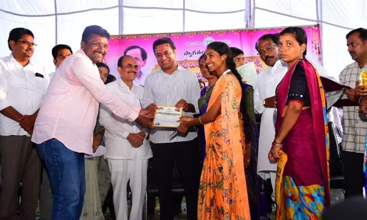 Minister KT Rama Rao distributed financial assistance to the beneficiaries by SC Corporation and double bedroom houses at Sircilla on Tuesday.