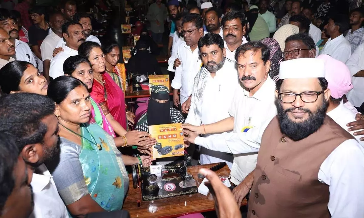 Chief Whip D Vinay Bhaskar distributing sewing machines to the jobless minority women in Hanumakonda on Tuesday